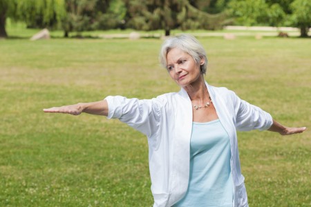 Senior women doing tai chi to help osteoporosis