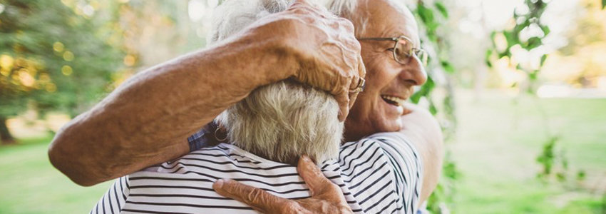 Senior couple in happy embrace
