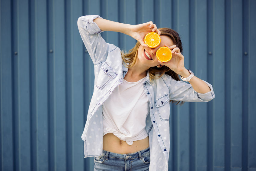 Happy woman with fresh food