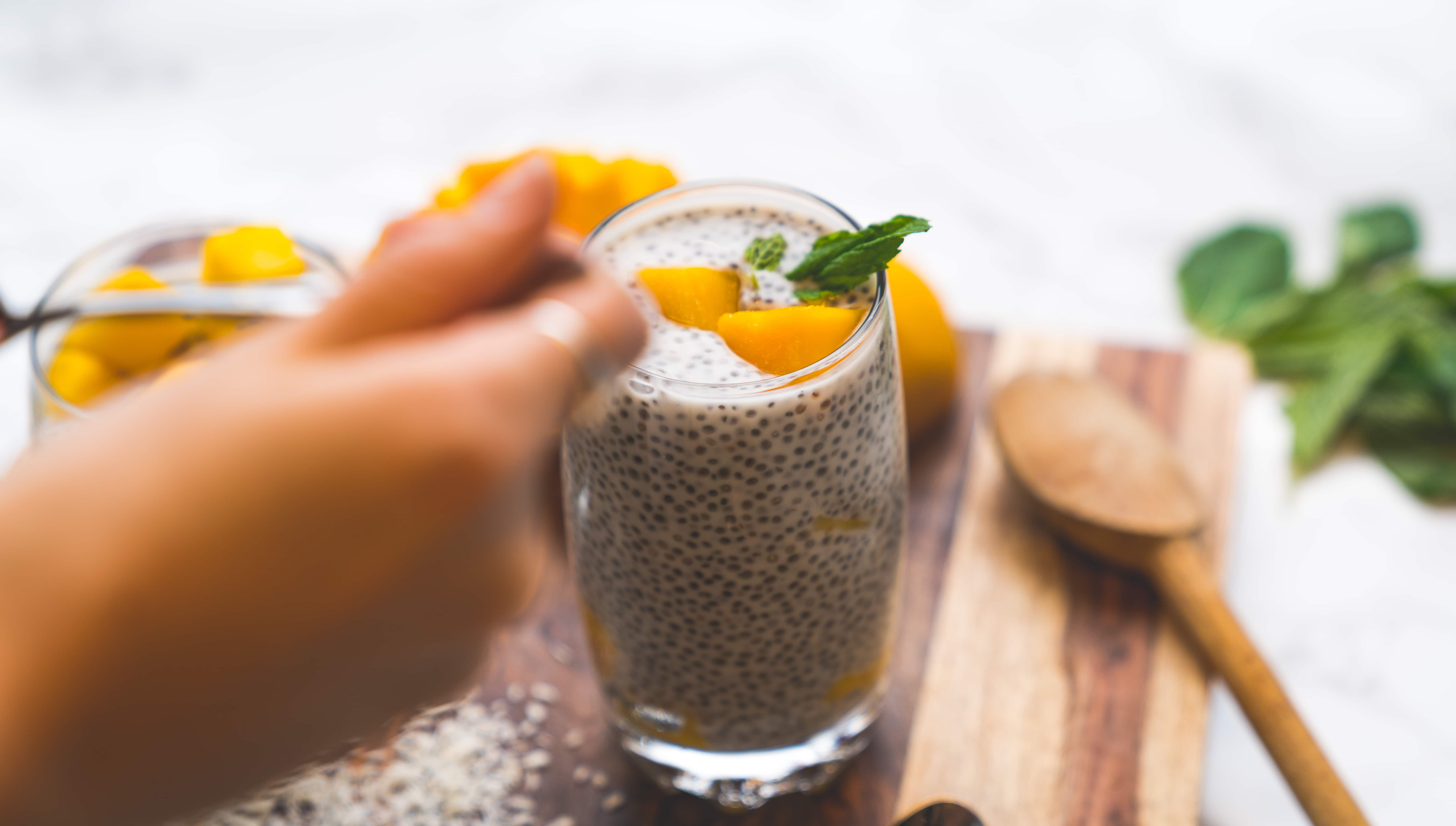 Close up chia pudding with hand