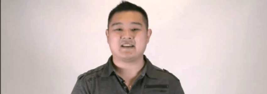 Kyle Lim in black collared shirt