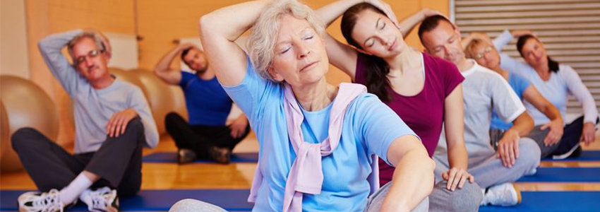 Senior woman in fitness class