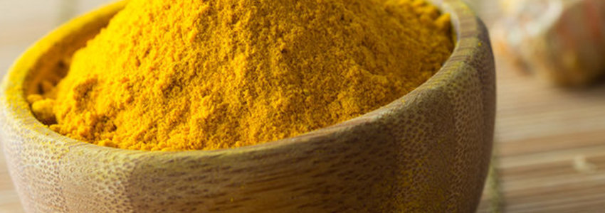 Bowl of turmeric powder
